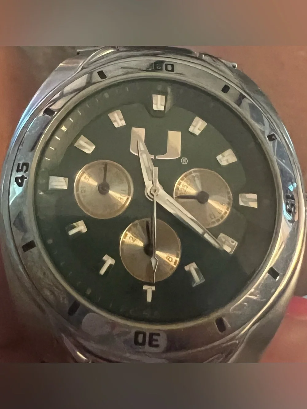 Fossil Miami Hurricanes Men’s Stainless Steel Green Dial Watch